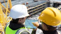 Construction Workers Looking at Ipad